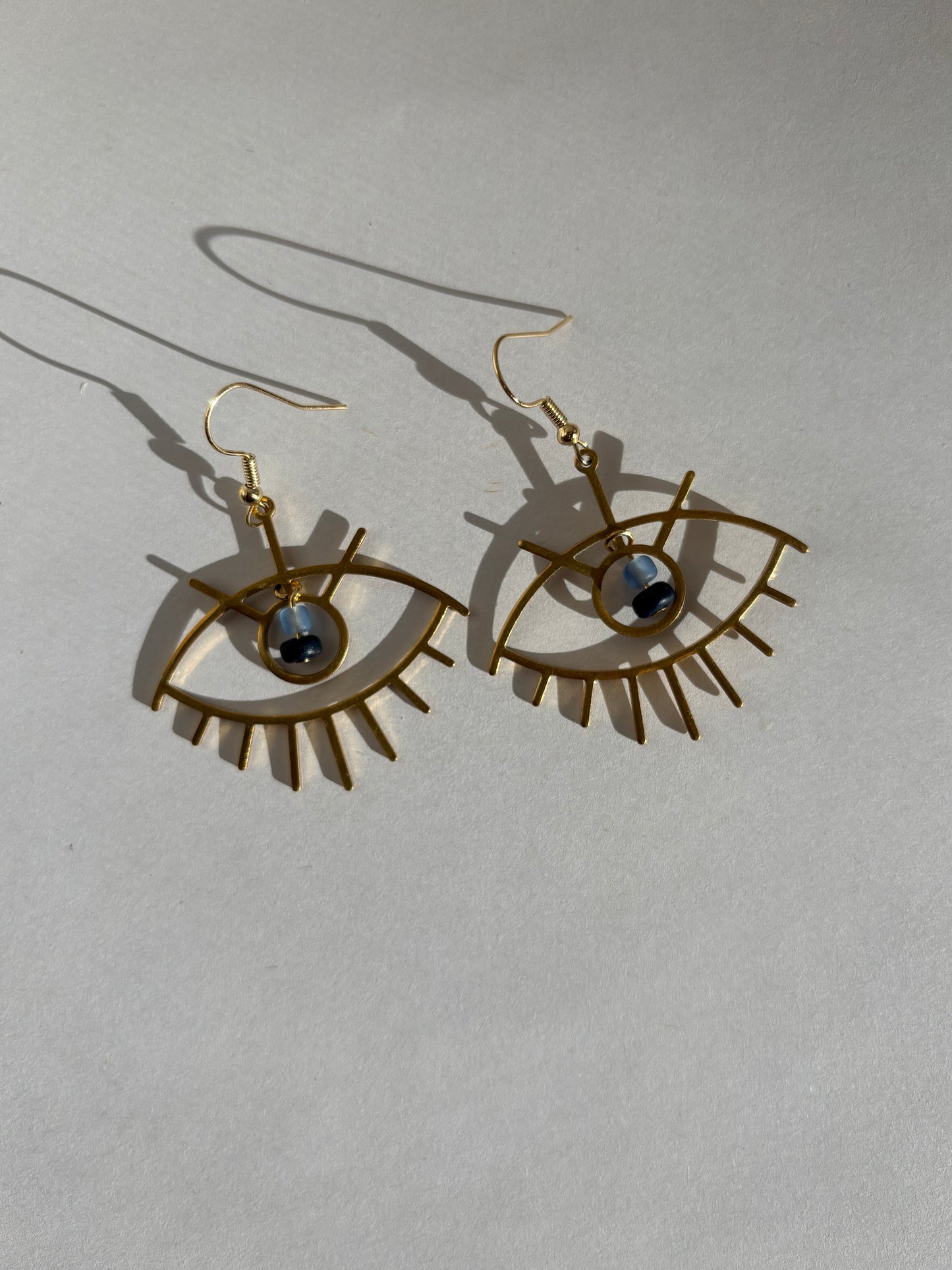 Brass Eye with Blue Glass Beads Earring